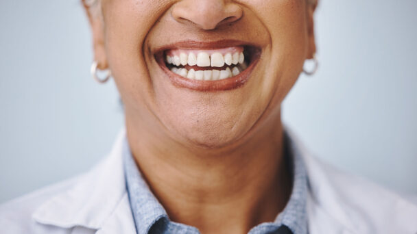 Dental Smile And Elderly Woman In Studio